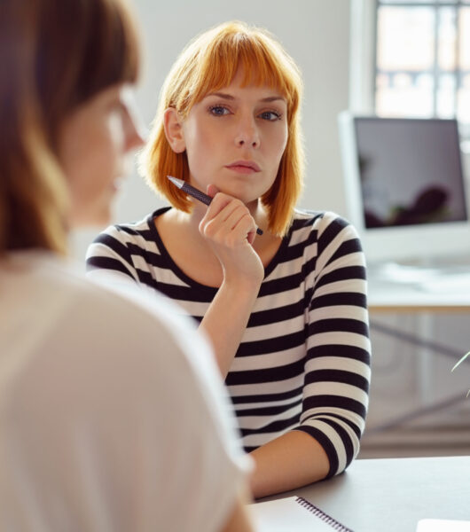 Thoughtful,Young,Redhead,Businesswoman,Watching,Her,Female,Colleague,Waiting,For Thoughtful,Young,Redhead,Businesswoman,Watching,Her,Female,Colleague,Waiting,For